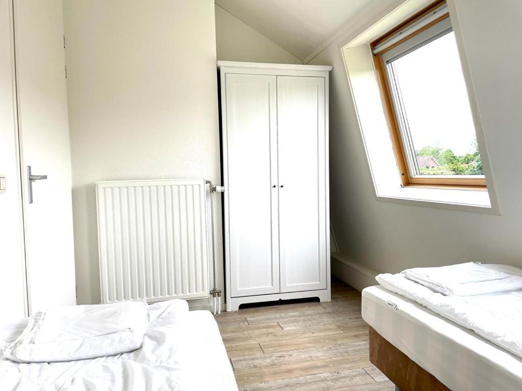 Vakantiewoningen De Schelp غينيسَّ المظهر الخارجي الصورة